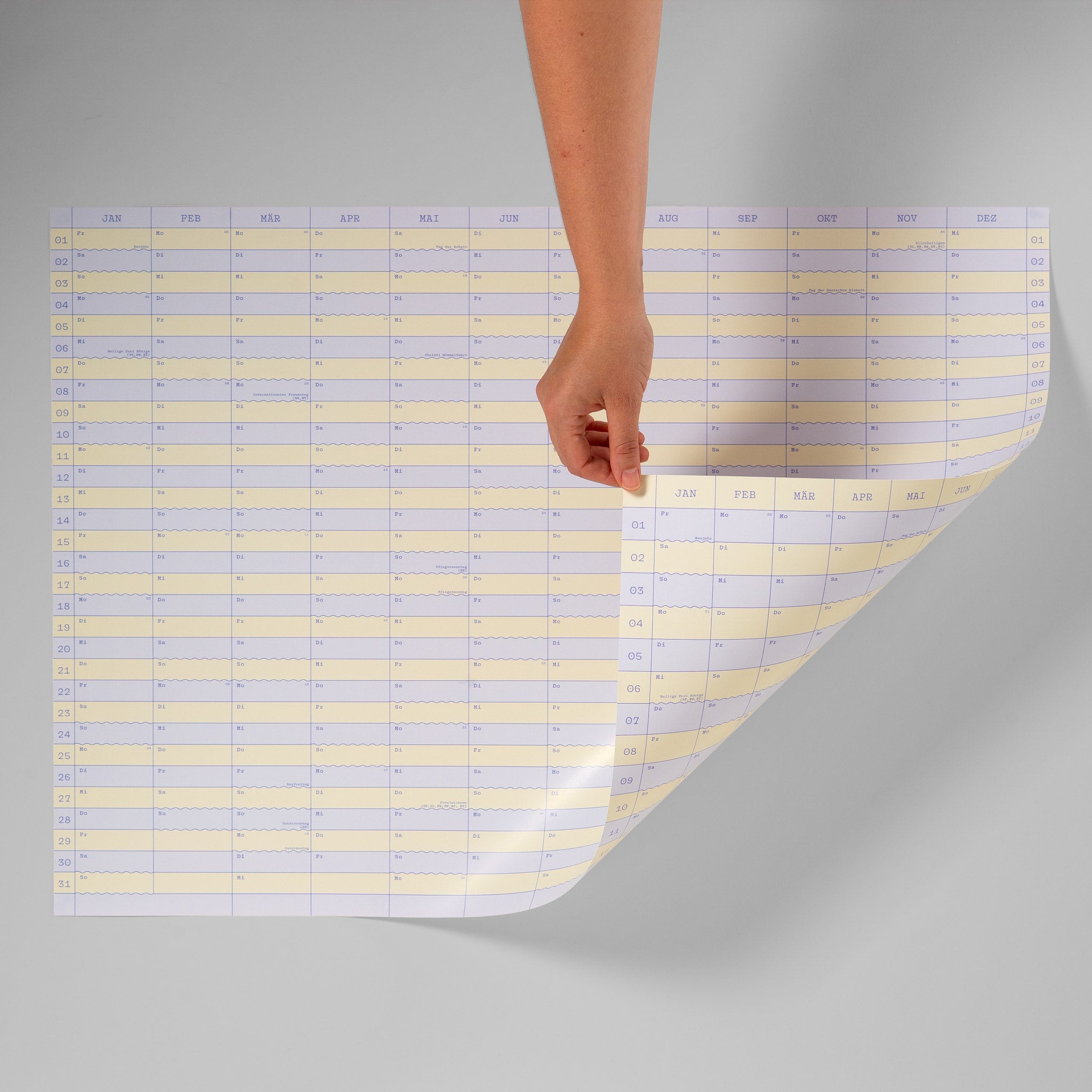 Wandkalender 2027, lila-gelb gestreift, Querformat – Vorder- und Rückseite
